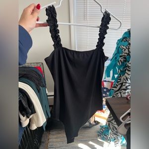 Black ripped bodysuit